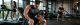 Bodybuilding i drugi sportovi kao različiti oblici fizičkog treningaperforms a seated dumbbell curl on an incline bench, 16 kg weight in hand, with gym equipment in the background.